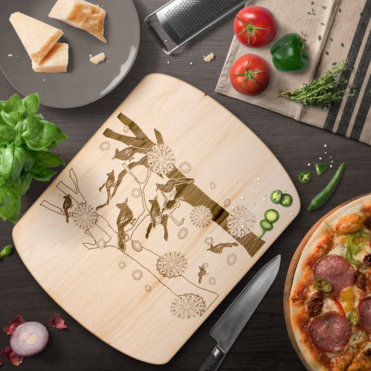 Cardinals In The Winter Snow Oval Cutting Board