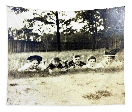 Early 1900s Women In Hats Lay On The Grass - Tapestry